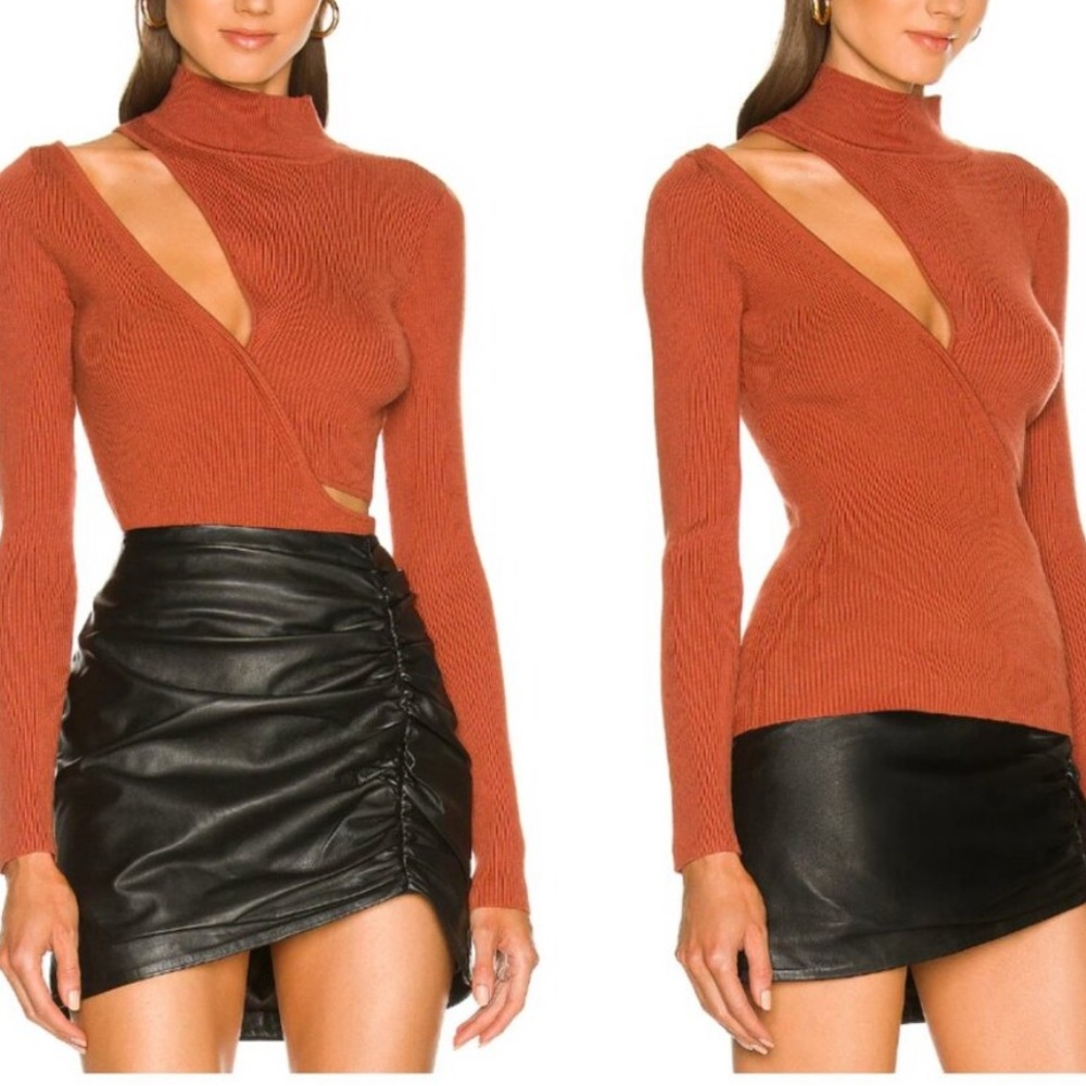 Michael Costello x Revolve Soraya Turtleneck Rib Cut Out Sweater in Rust